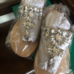 Brand new in packaging sandals.